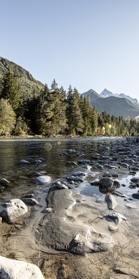 Fischer am Inn im Engadin