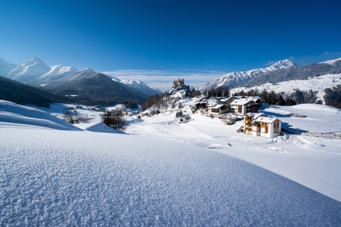 The castle Tarasp in winter from Lai Nair.